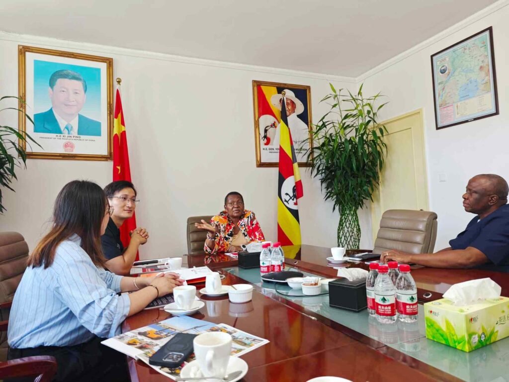 ZW Group executives engaging in a strategic dialogue with H.E. Ambassador Oliver Wonekha of Uganda regarding heavy transport and infrastructure cooperation in Beijing.
